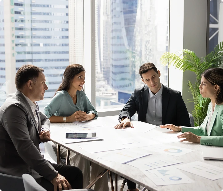 small business leadership team meeting with financial consultant